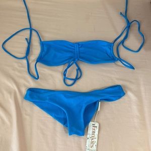 supper cute blue two piece bikini set from Frankie’s bikinis!